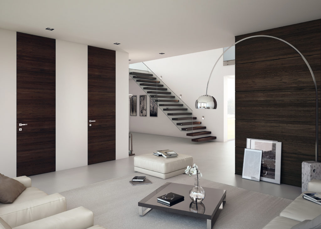 porte a tutta altezza filo muro​ in legno