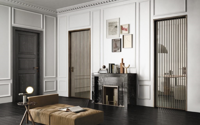 Porte in legno massiccio e porte in vetro e profili metallici