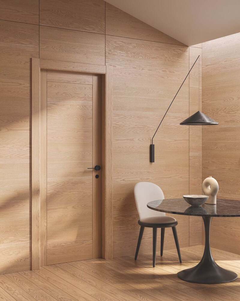 Porta a battente in legno pangea coordinata alla boiserie