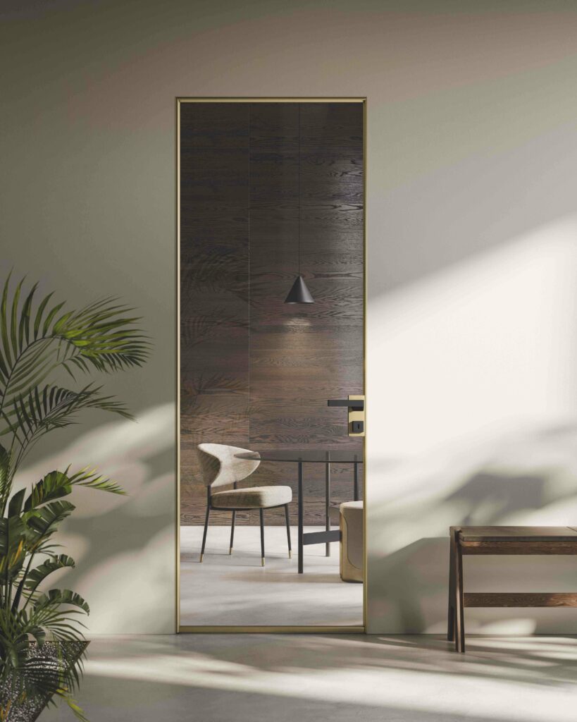 porta in vetro raso muro garofoli profili metallici oro