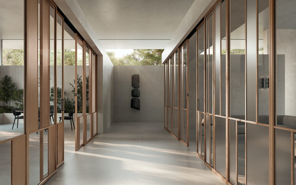 porte scorrevoli in vetro con profili legno garofoli NOI