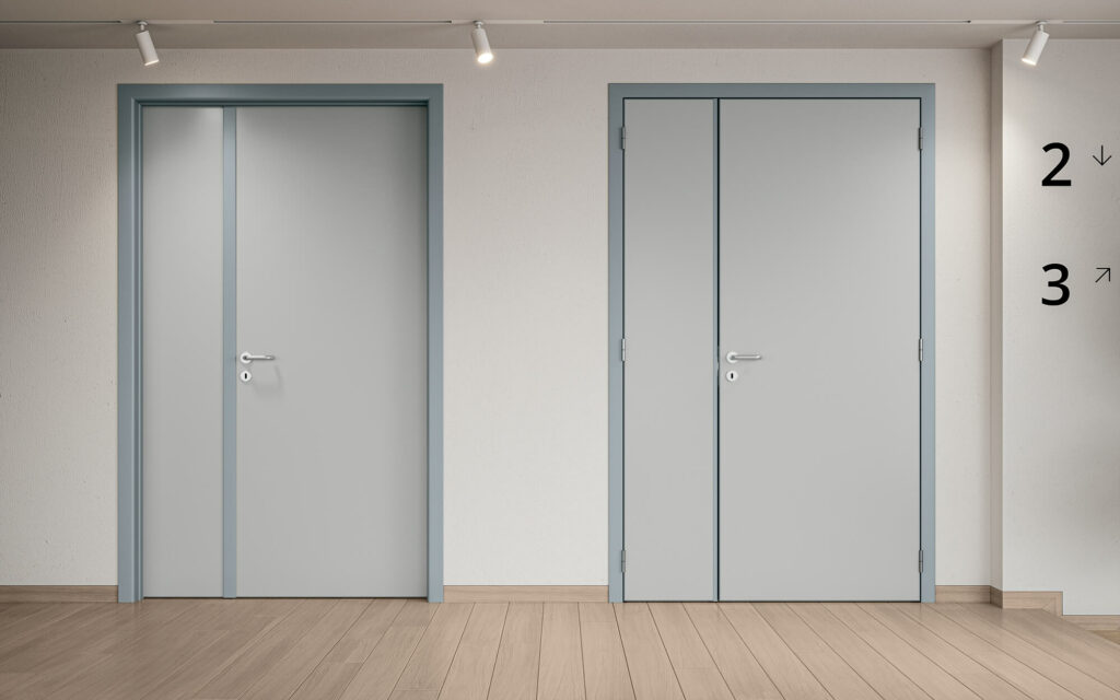 Porta tecnica per ospedali Gidea modello Senia 1LT in HPL grigio perla con telaio RAL 7001, ideale per ambienti sanitari e scolastici